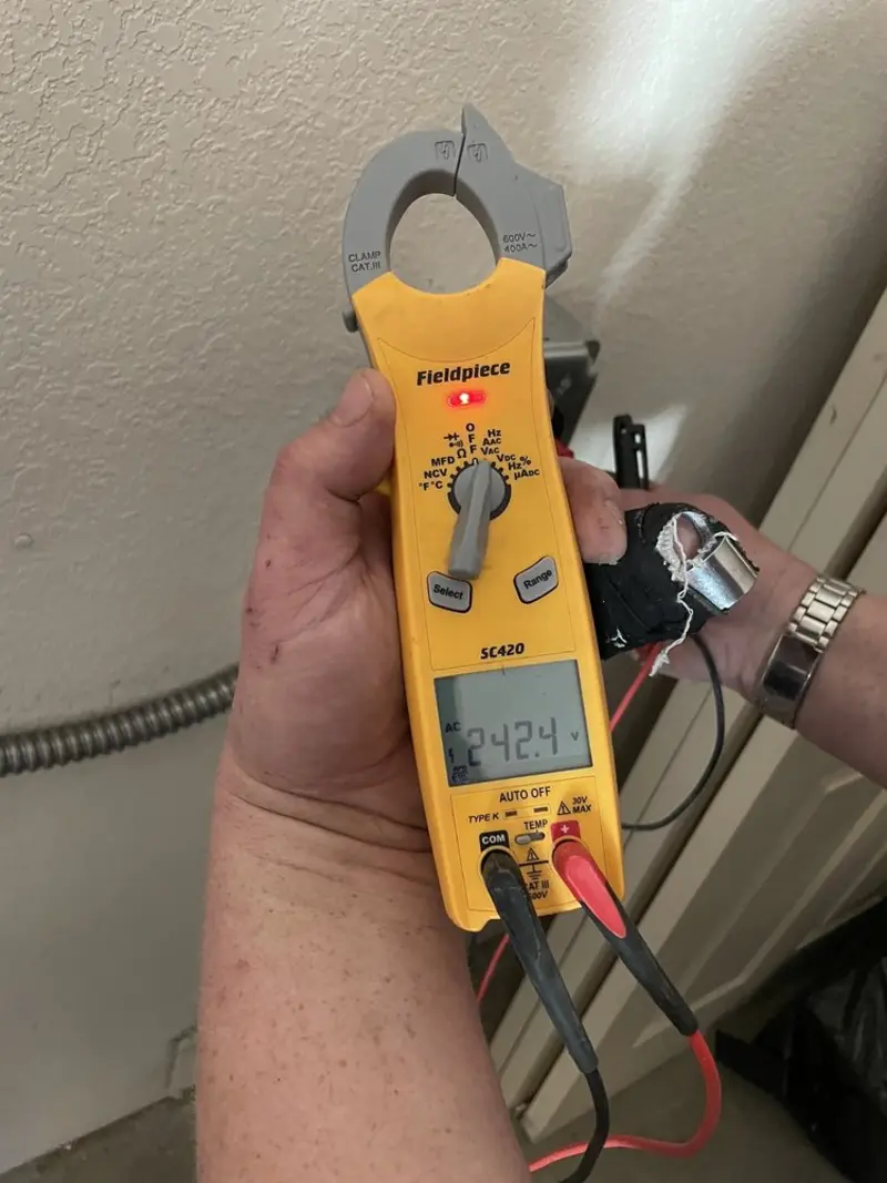 Voltage testing with clamp meter during Aluminum Wiring Replacement in Parkville